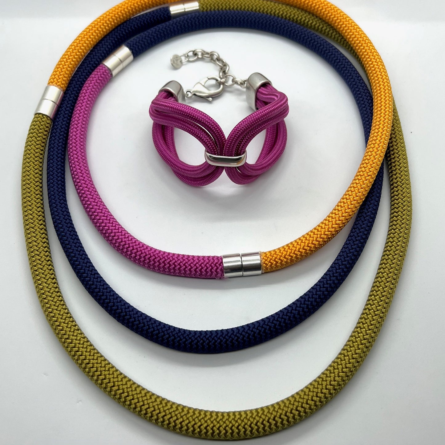 EVOLVE: A travel-ready colorful modular necklace in a sunset palette