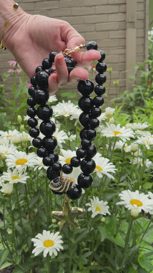 Chunky Gold Star Pendant on Black Beaded Statement Necklace